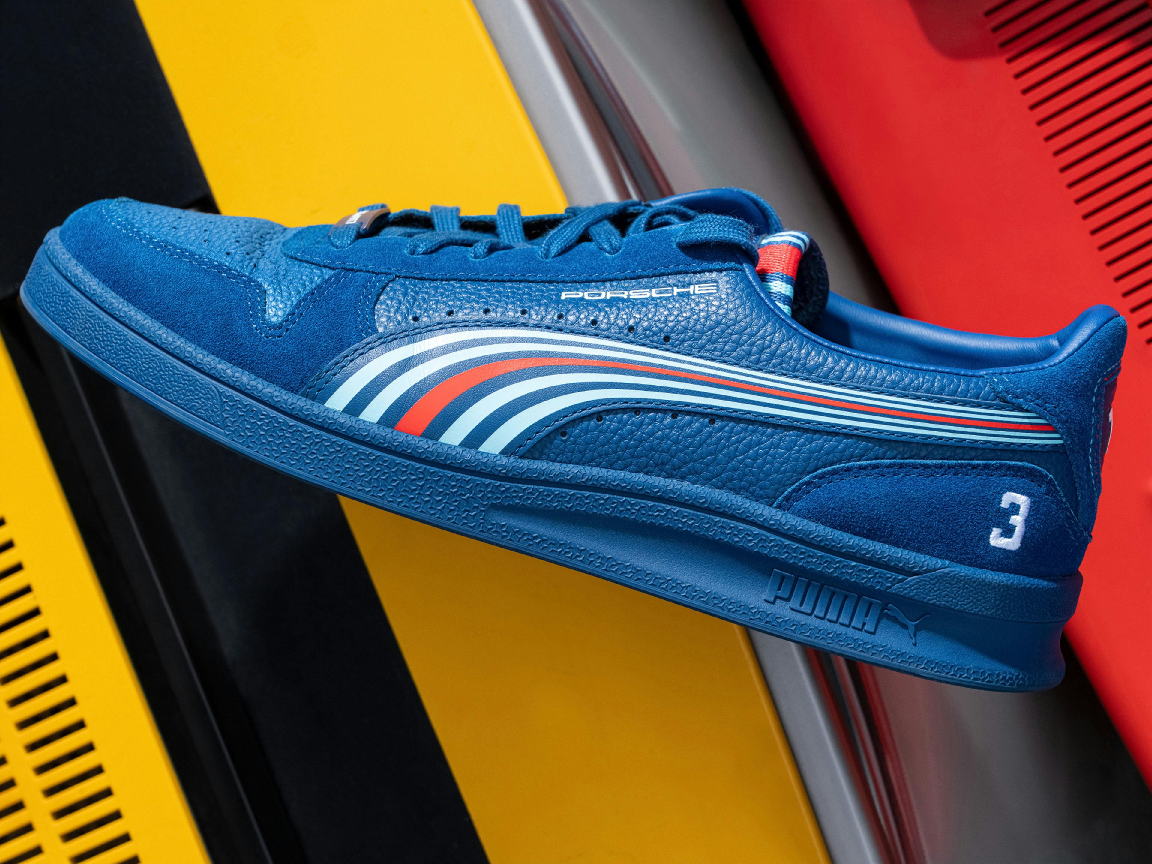 Detail shot of a blue Porsche x MARTINI RACING® sneaker with start number 3.
